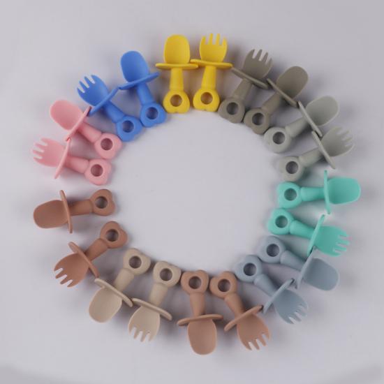 Cuillère d'entraînement en silicone souple pour bébé